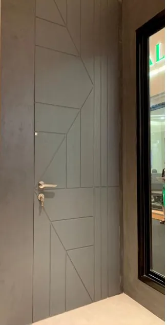 Grey door with linear pattern at IndoBuildTech 2025